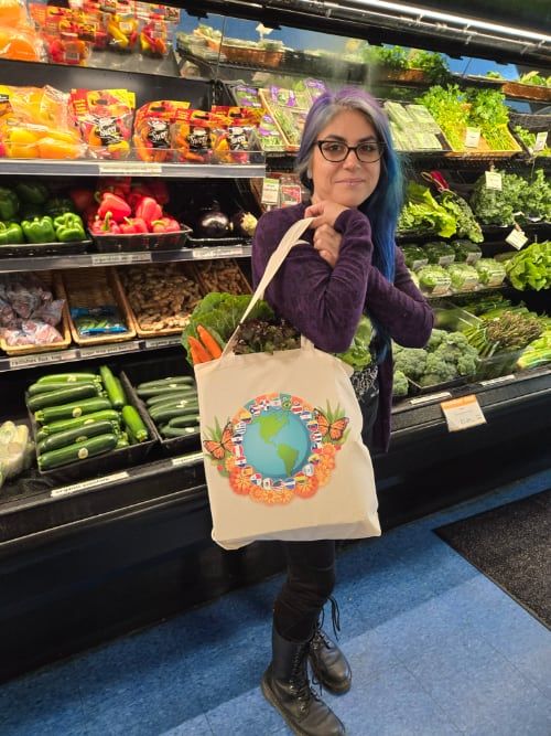 Ashley modeling a shoulder bag